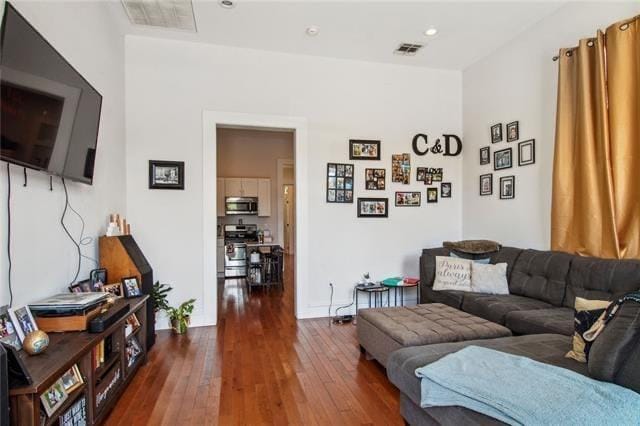 264545 Saint Ann St, New Orleans, LA 70119 - living area with visible vents, recessed lighting, and dark wood-style flooring