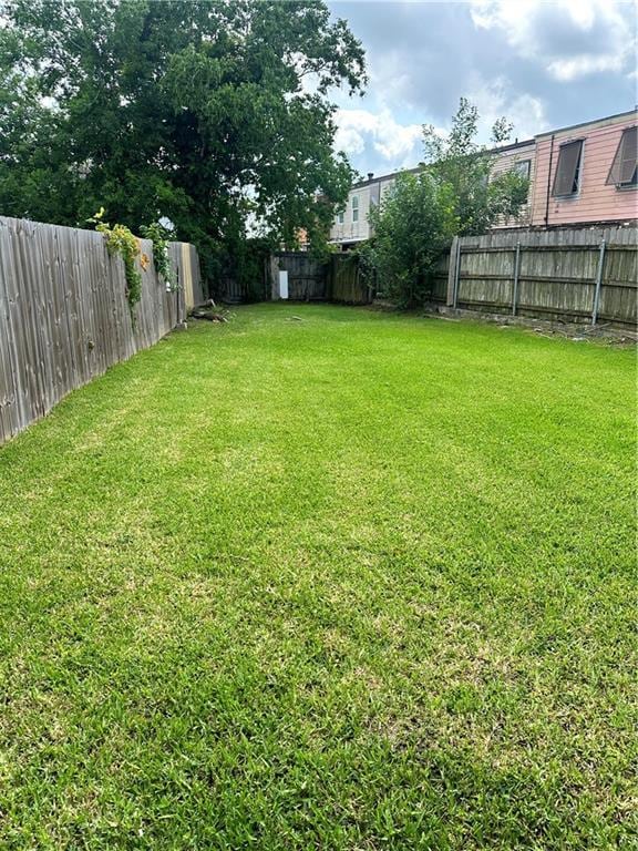 264545 Saint Ann St, New Orleans, LA 70119 - view of yard featuring a fenced backyard