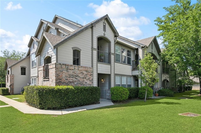 350 Emerald Forest Blvd Unit 9102, Covington, LA 70433 - view of front of property featuring a shingled roof and a front yard