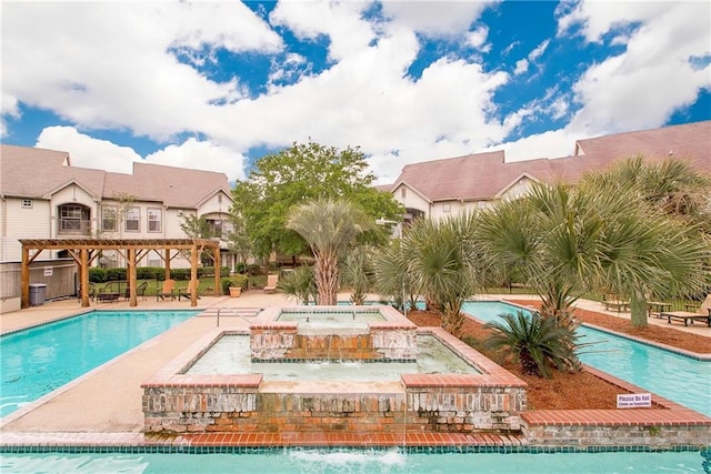 350 Emerald Forest Blvd Unit 9102, Covington, LA 70433 - pool featuring a pergola, a community hot tub, and a patio
