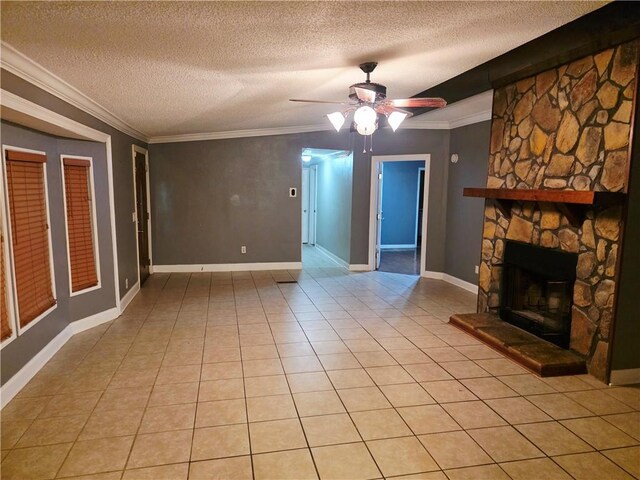 4967A Jean Lafitte Blvd, Lafitte, LA 70067 - unfurnished living room featuring a textured ceiling, ceiling fan, ornamental molding, a fireplace, and light tile patterned floors