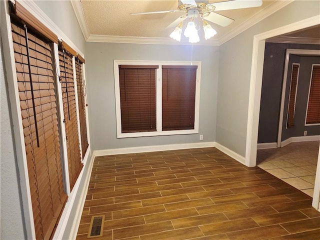 4967A Jean Lafitte Blvd, Lafitte, LA 70067 - interior space with ornamental molding, baseboards, and dark wood-type flooring