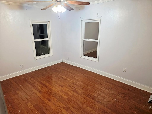 4967A Jean Lafitte Blvd, Lafitte, LA 70067 - unfurnished room featuring wood finished floors, baseboards, a ceiling fan, and crown molding