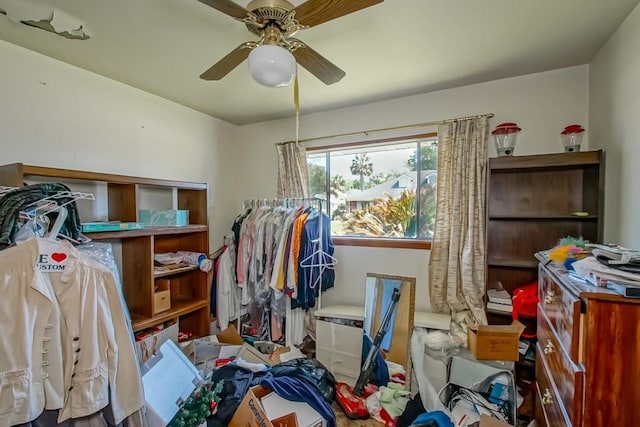 interior space featuring a ceiling fan