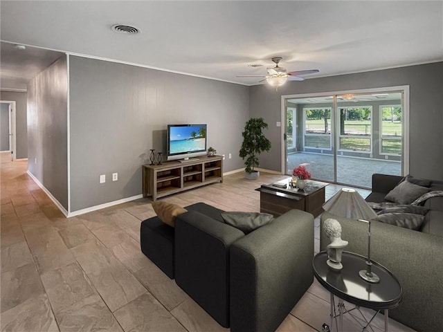 305 Country Club Blvd, Slidell, LA 70458 - living room with ceiling fan, baseboards, ornamental molding, and visible vents