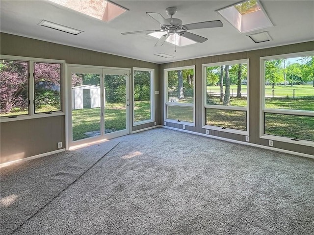 305 Country Club Blvd, Slidell, LA 70458 - unfurnished sunroom featuring carpet floors, a wealth of natural light, and ceiling fan