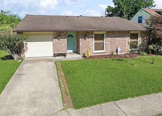 2638 Gallinghouse St, New Orleans, LA 70131 - ranch-style house featuring an attached garage, brick siding, and concrete driveway