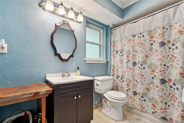 2638 Gallinghouse St, New Orleans, LA 70131 - bathroom with tile patterned floors, vanity, toilet, a shower with curtain, and baseboards