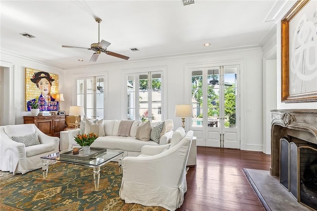 10005 Sauve Oak Ln, River Ridge, LA 70123 - living room with dark wood finished floors, ceiling fan, crown molding, and visible vents