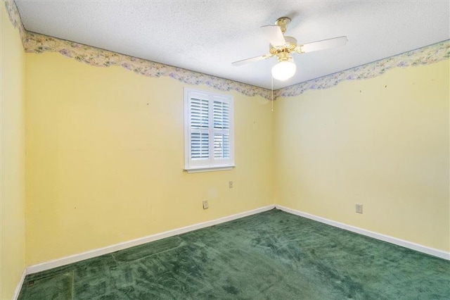 429 Bertolino Dr, Kenner, LA 70065 - unfurnished room with dark colored carpet, a textured ceiling, baseboards, and ceiling fan