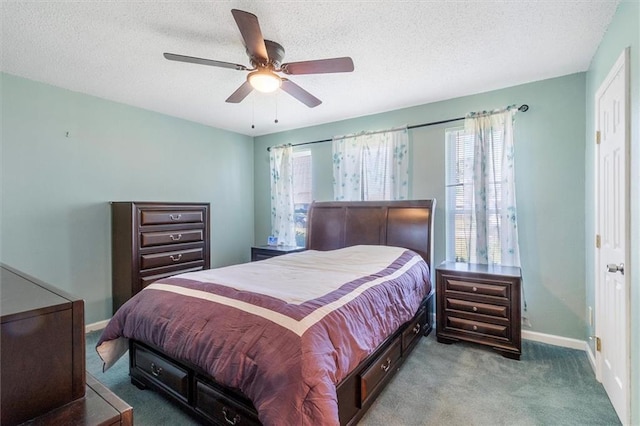 429 Bertolino Dr, Kenner, LA 70065 - bedroom featuring carpet, a textured ceiling, a ceiling fan, and baseboards