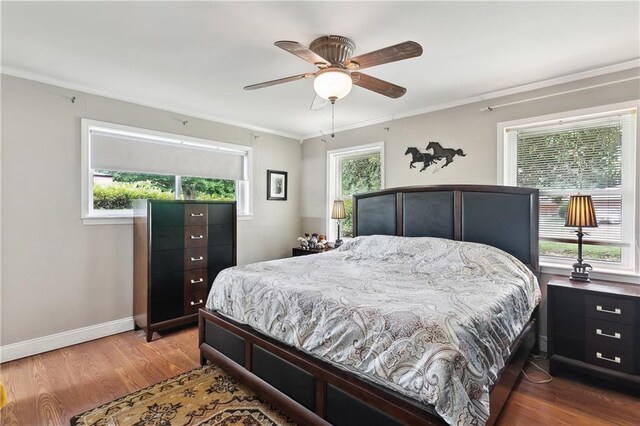 123 Robinhood Rd, Covington, LA 70433 - bedroom featuring crown molding, baseboards, ceiling fan, and wood finished floors