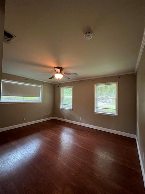 123 Robinhood Rd, Covington, LA 70433 - unfurnished room with ornamental molding, baseboards, dark wood-style floors, ceiling fan, and a smoke detector