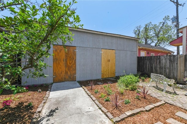 2426 Chippewa St, New Orleans, LA 70130 - view of outbuilding featuring fence and an outbuilding