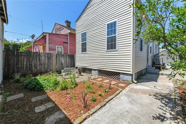 2426 Chippewa St, New Orleans, LA 70130 - view of side of property with fence and central AC