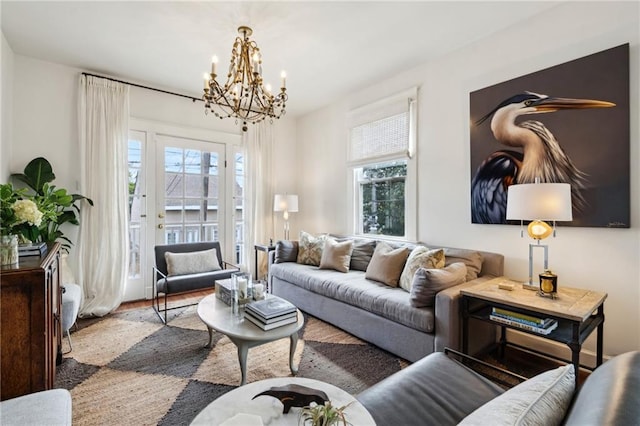 370507 Laurel St, New Orleans, LA 70115 - living room featuring an inviting chandelier and wood finished floors