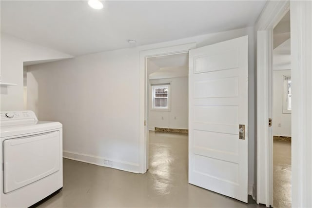 370507 Laurel St, New Orleans, LA 70115 - clothes washing area featuring washer / dryer, laundry area, and baseboards