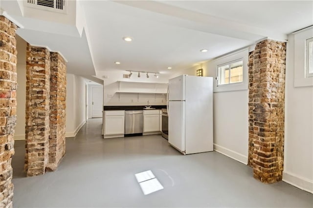 370507 Laurel St, New Orleans, LA 70115 - kitchen with freestanding refrigerator, dishwasher, visible vents, and finished concrete flooring