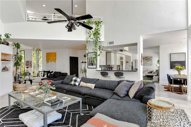 4809 Neyrey Dr, Metairie, LA 70002 - living area featuring a towering ceiling, a ceiling fan, and recessed lighting
