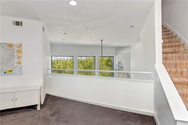 4809 Neyrey Dr, Metairie, LA 70002 - corridor with carpet and recessed lighting