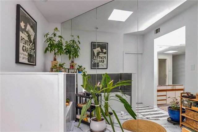4809 Neyrey Dr, Metairie, LA 70002 - interior space with a skylight