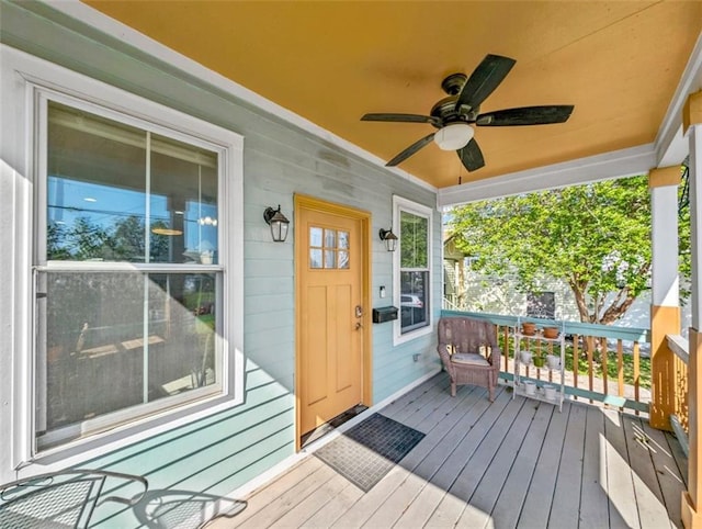 2738 Cleveland Ave, New Orleans, LA 70119 - wooden deck with a ceiling fan and covered porch