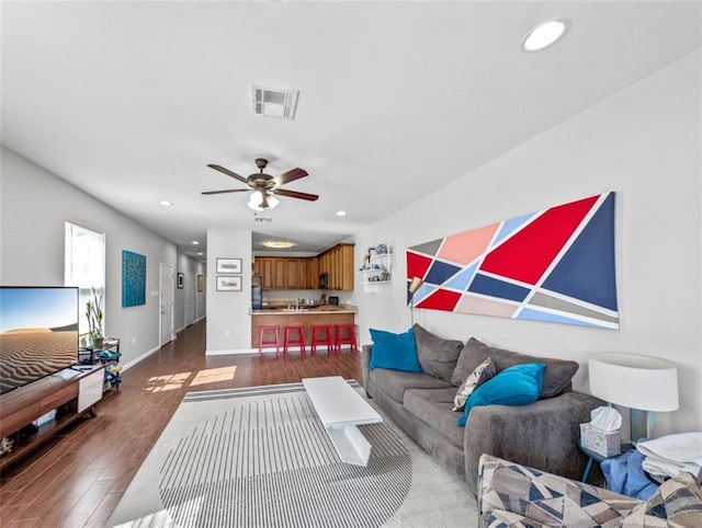 2738 Cleveland Ave, New Orleans, LA 70119 - living room with a ceiling fan, visible vents, recessed lighting, and dark wood-style flooring
