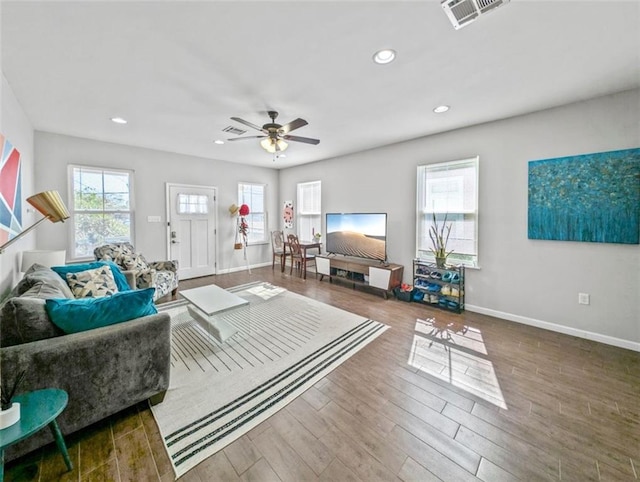 2738 Cleveland Ave, New Orleans, LA 70119 - living room with baseboards, wood finished floors, visible vents, and recessed lighting