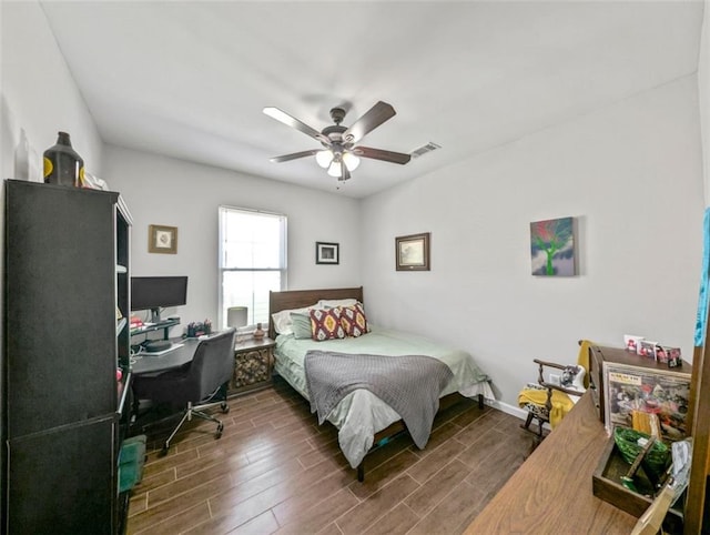2738 Cleveland Ave, New Orleans, LA 70119 - bedroom with a ceiling fan, dark wood-type flooring, and visible vents