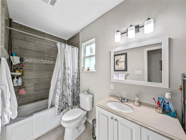 2738 Cleveland Ave, New Orleans, LA 70119 - full bath with shower / bath combination with curtain, toilet, vanity, and baseboards