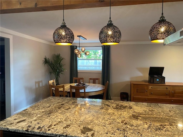 dining room featuring ornamental molding