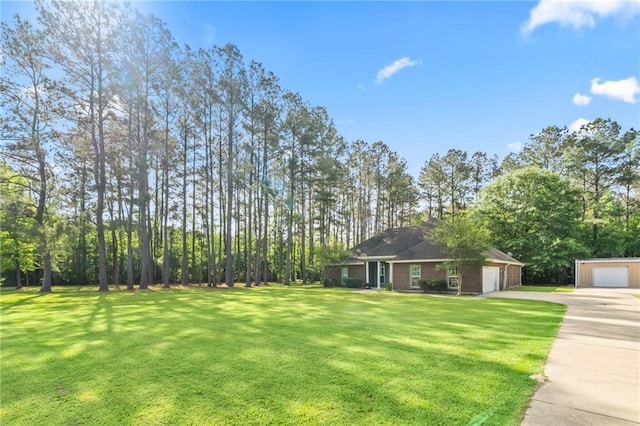exterior space featuring concrete driveway