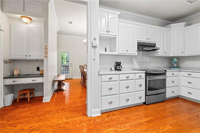 kitchen featuring stainless steel electric range, light wood finished floors, ornamental molding, under cabinet range hood, and white cabinetry