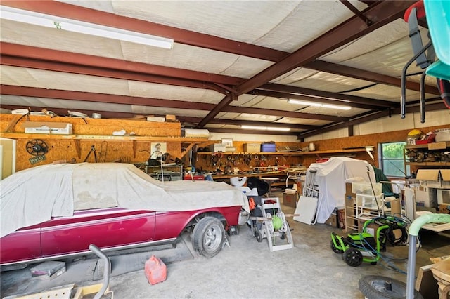 garage with a workshop area