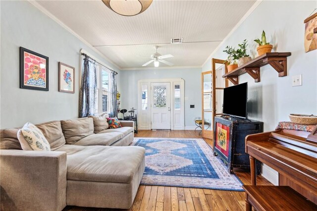 517 S Murat St, New Orleans, LA 70119 - living room with light wood-type flooring, a ceiling fan, and crown molding