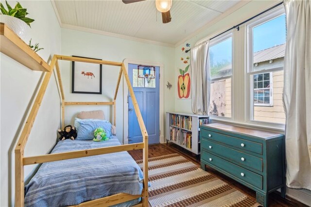 517 S Murat St, New Orleans, LA 70119 - bedroom featuring wood finished floors, crown molding, and a ceiling fan