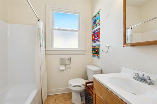 517 S Murat St, New Orleans, LA 70119 - full bath with vanity, tile patterned flooring, and shower / bath combo