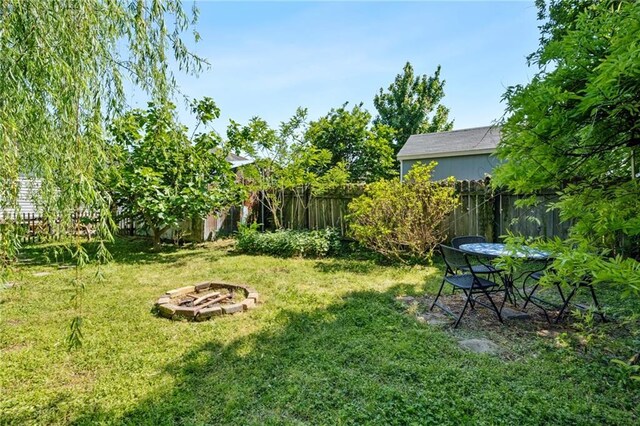 517 S Murat St, New Orleans, LA 70119 - view of yard with an outdoor fire pit