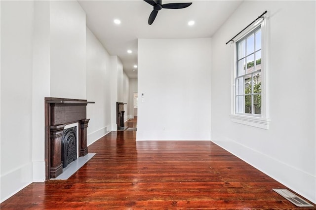 2642-4444 Lepage St, New Orleans, LA 70119 - unfurnished living room featuring a fireplace with flush hearth, a ceiling fan, wood finished floors, and recessed lighting
