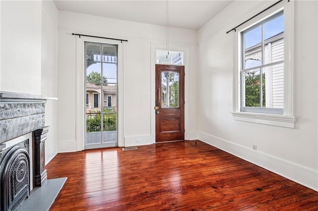 2642-4444 Lepage St, New Orleans, LA 70119 - foyer entrance featuring a fireplace and wood finished floors