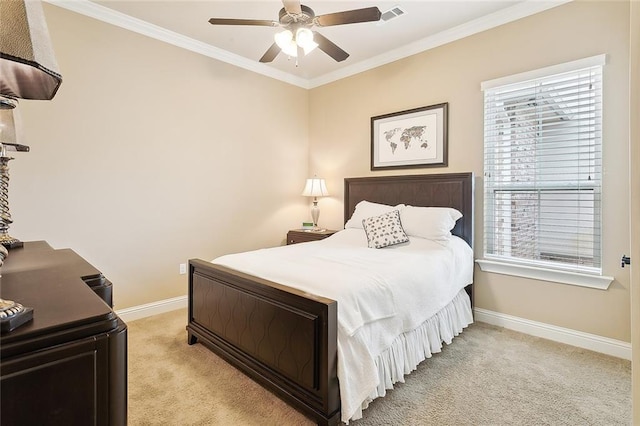 bedroom with a ceiling fan, baseboards, visible vents, crown molding, and light carpet