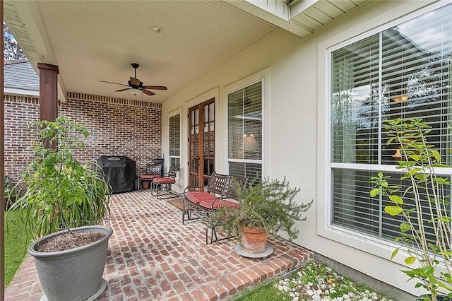 view of patio / terrace featuring ceiling fan and grilling area