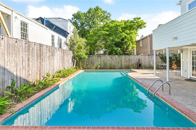 3439 Octavia St, New Orleans, LA 70125 - view of swimming pool featuring a fenced backyard, a patio area, and a fenced in pool