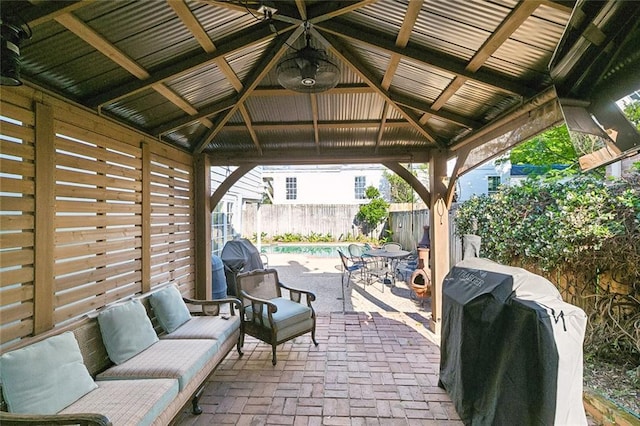 3439 Octavia St, New Orleans, LA 70125 - view of patio featuring a gazebo, a fenced in pool, a fenced backyard, and grilling area