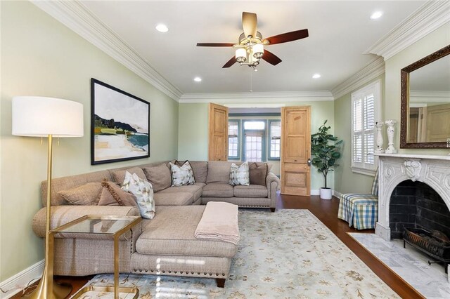 3439 Octavia St, New Orleans, LA 70125 - living room featuring crown molding, dark wood-style flooring, a ceiling fan, and recessed lighting