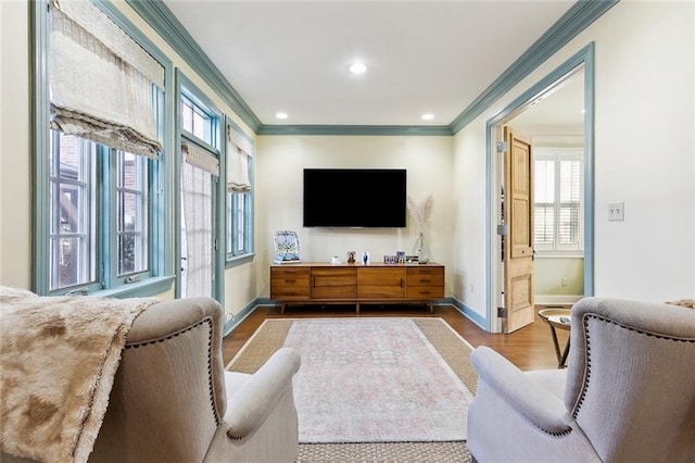 3439 Octavia St, New Orleans, LA 70125 - living room with ornamental molding, baseboards, recessed lighting, and wood finished floors