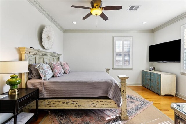 3439 Octavia St, New Orleans, LA 70125 - bedroom with visible vents, wood finished floors, baseboards, and ornamental molding