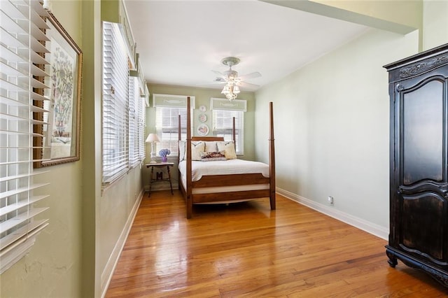 3439 Octavia St, New Orleans, LA 70125 - bedroom with baseboards, light wood-style floors, and a ceiling fan