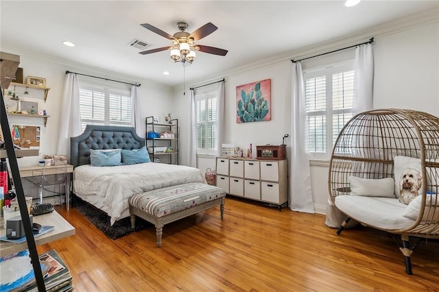 3439 Octavia St, New Orleans, LA 70125 - bedroom featuring light wood-style floors, visible vents, ornamental molding, and recessed lighting