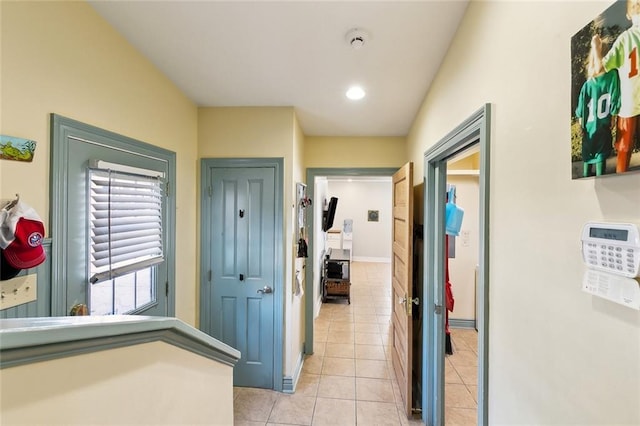 3439 Octavia St, New Orleans, LA 70125 - hall featuring baseboards, light tile patterned floors, and recessed lighting